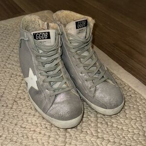 Golden Goose with Shearling lining.